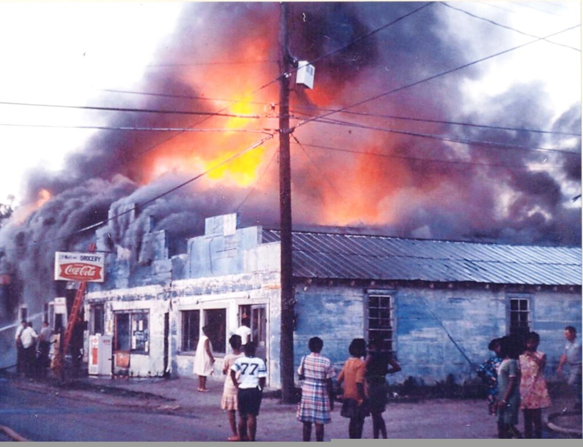 A newspaper photo of the fire that burned Haney's Big House in 1966. Concordia Sentinel/August Thompson.