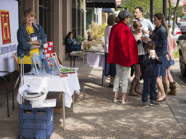 Authors on the beautiful Main Street chat with folks and offer books for sale