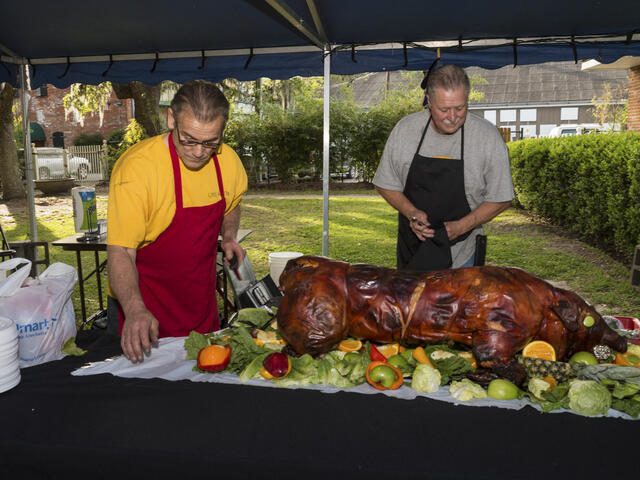 Opening reception features a Cajun cochon de lait (pig roast)