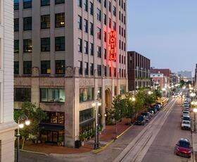 The exterior of The Barnett in New Orleans at dusk.