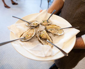 Raw oysters from Oxlot 9 restaurant in Covington, Louisiana, served on the half shell with a blend of spices.