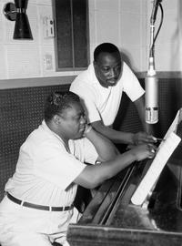 Antoine "Fats" Domino and Dave Bartholomew, who helped define the sound of rock and roll. The Charles L. Franck Studio Collection at The Historic New Orleans Collection, 1994.94.2.2286. Photo by Franck-Bertacci Photographers.